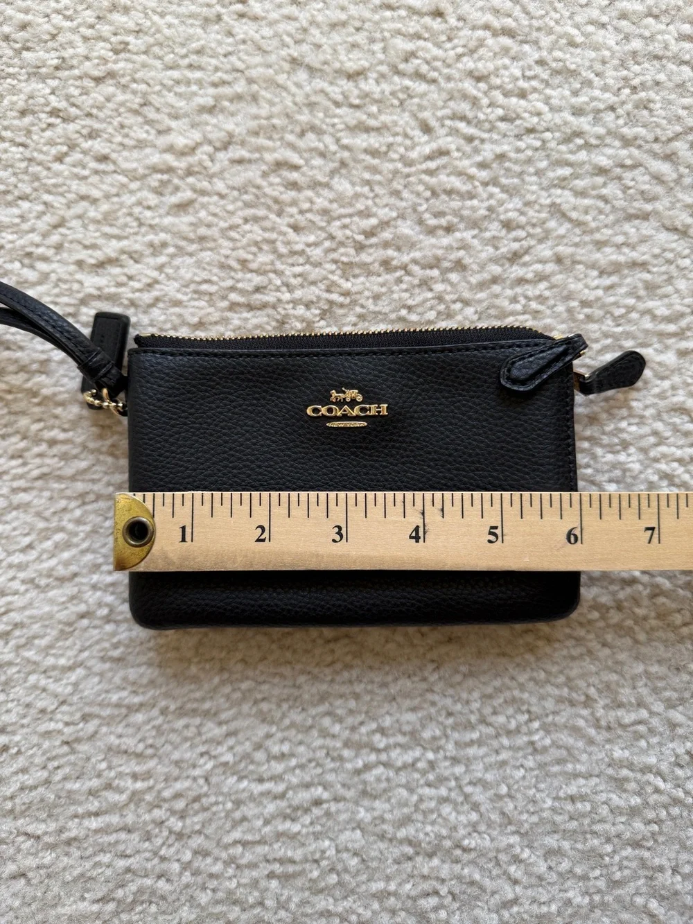 Coach Black Pebbled Leather Pouch with Gold Emblem